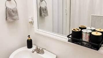 Hair dryer, towels, soap, toilet paper