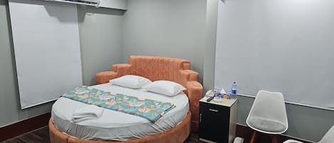 Premium bedding, down comforters, Select Comfort beds, laptop workspace