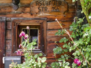 Exterior detail - Traditional Tyrolean house, ski lift nearby (Kirchberg in Tirol)