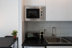 Fridge, microwave, coffee/tea maker, electric kettle