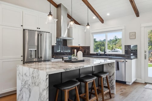 LuxoStays Bright & Cozy 4BR Home • 5 Beds • 2 Baths • Serene Escape