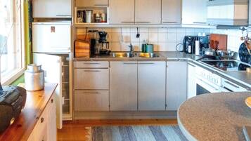 Fridge, microwave, cookware/dishes/utensils