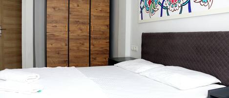 Desk, laptop workspace, iron/ironing board