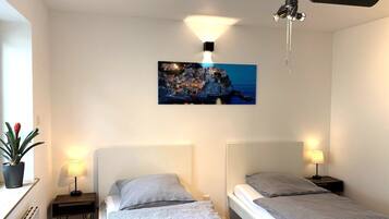 1 habitación, tabla de planchar con plancha, wifi y ropa de cama