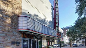 A theater with a marquee, a brick facade, and a covered entrance area. - Heritage Loft @ The Murphy House, Chippewa Square! (Savannah)
