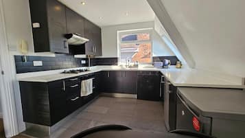 Apartment | Private kitchen | Fridge, microwave, oven, stovetop