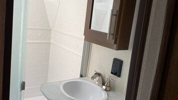 Shower, towels, soap, shampoo