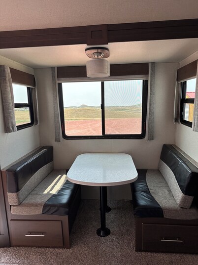 Tremendous camper with A/C and full hookups. Close to the Camplex. 