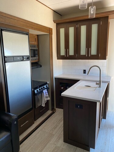 Tremendous camper with A/C and full hookups. Close to the Camplex. 