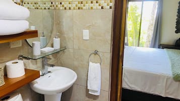 Comfort Bungalow, Balcony, Partial Ocean View | Bathroom | Free toiletries
