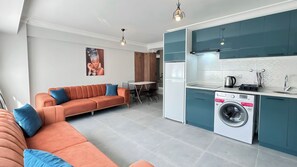Junior Apartment | Private kitchen | Full-sized fridge, stovetop, griddle, cookware/dishes/utensils