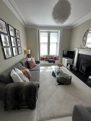 Smart TV, DVD player, books, video library