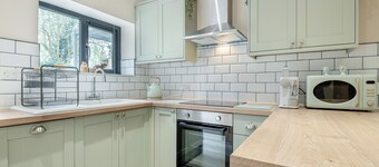 A luxury one bedroom cottage with bubbling hot tub.