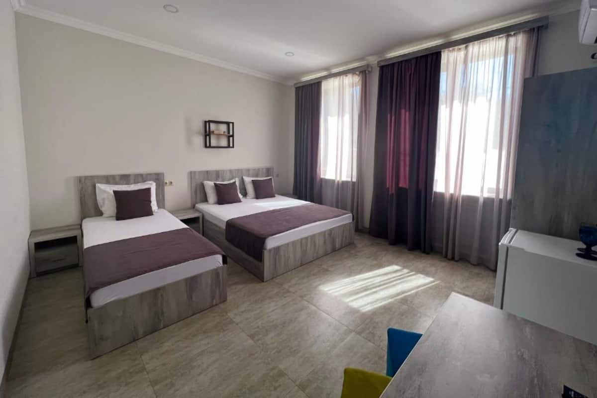 Standaard driepersoonskamer | 1 slaapkamer, gratis wifi, beddengoed