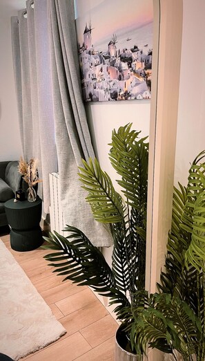 The Santorini Studio | Living area | 50-inch Smart TV with satellite channels, Netflix, streaming services - Canal Walk Studios (Southampton)