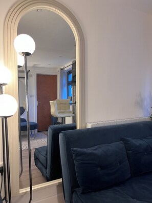 The Azures Suite | Living area | 50-inch Smart TV with satellite channels, Netflix, streaming services - Canal Walk Studios (Southampton)