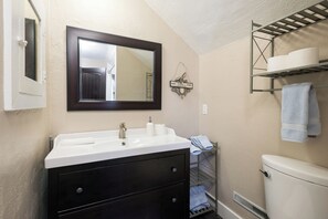 Hair dryer, towels, soap, shampoo