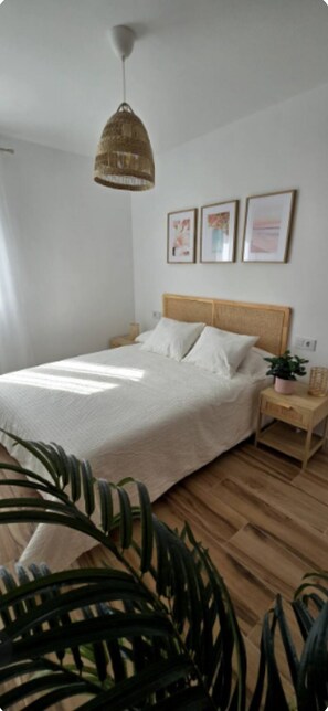 2 habitaciones, tabla de planchar con plancha, wifi y ropa de cama 