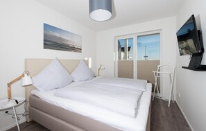 2 عدّة غرف نوم ومكواة/لوح كي وسرير سفر وواي فاي مجانًا