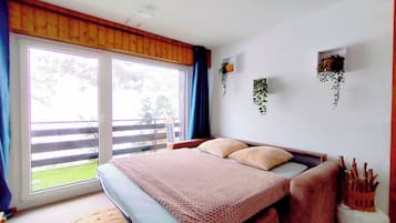 Family Apartment, Mountain View | Living area | Flat-screen TV