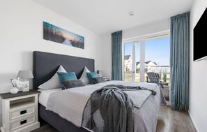 2 slaapkamers, een strijkplank/strijkijzer, reisbedje, gratis wifi