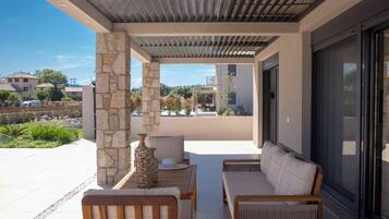 Luxury Villa, Lagoon View | Living area | Flat-screen TV