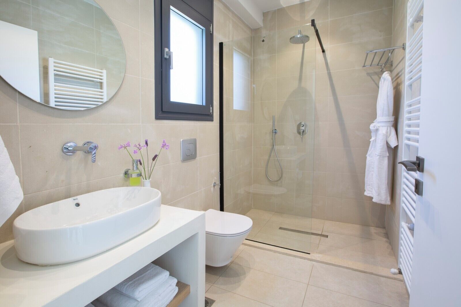 Shower, bathrobes, towels