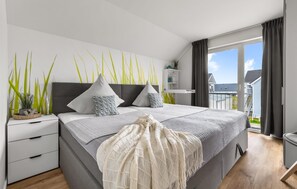 2 quartos, ferros/tábuas de passar roupa, berço de viagem