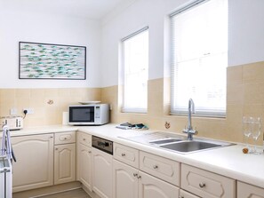 Dishwasher, high chair, cookware/dishes/utensils