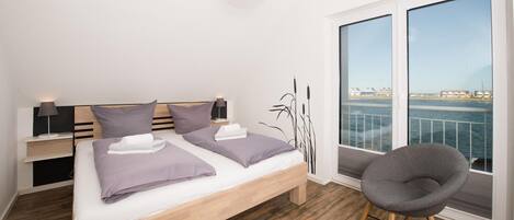 2 habitaciones, tabla de planchar con plancha y cuna de viaje