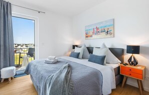 2 quartos, ferros/tábuas de passar roupa, berço de viagem