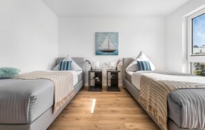 3 slaapkamers, een strijkplank/strijkijzer, reisbedje, gratis wifi