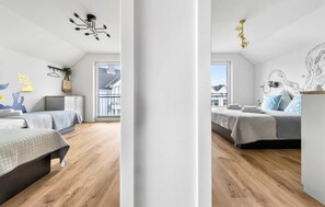 2 habitaciones, tabla de planchar con plancha y cuna de viaje 