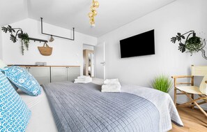 2 habitaciones, tabla de planchar con plancha y cuna de viaje 