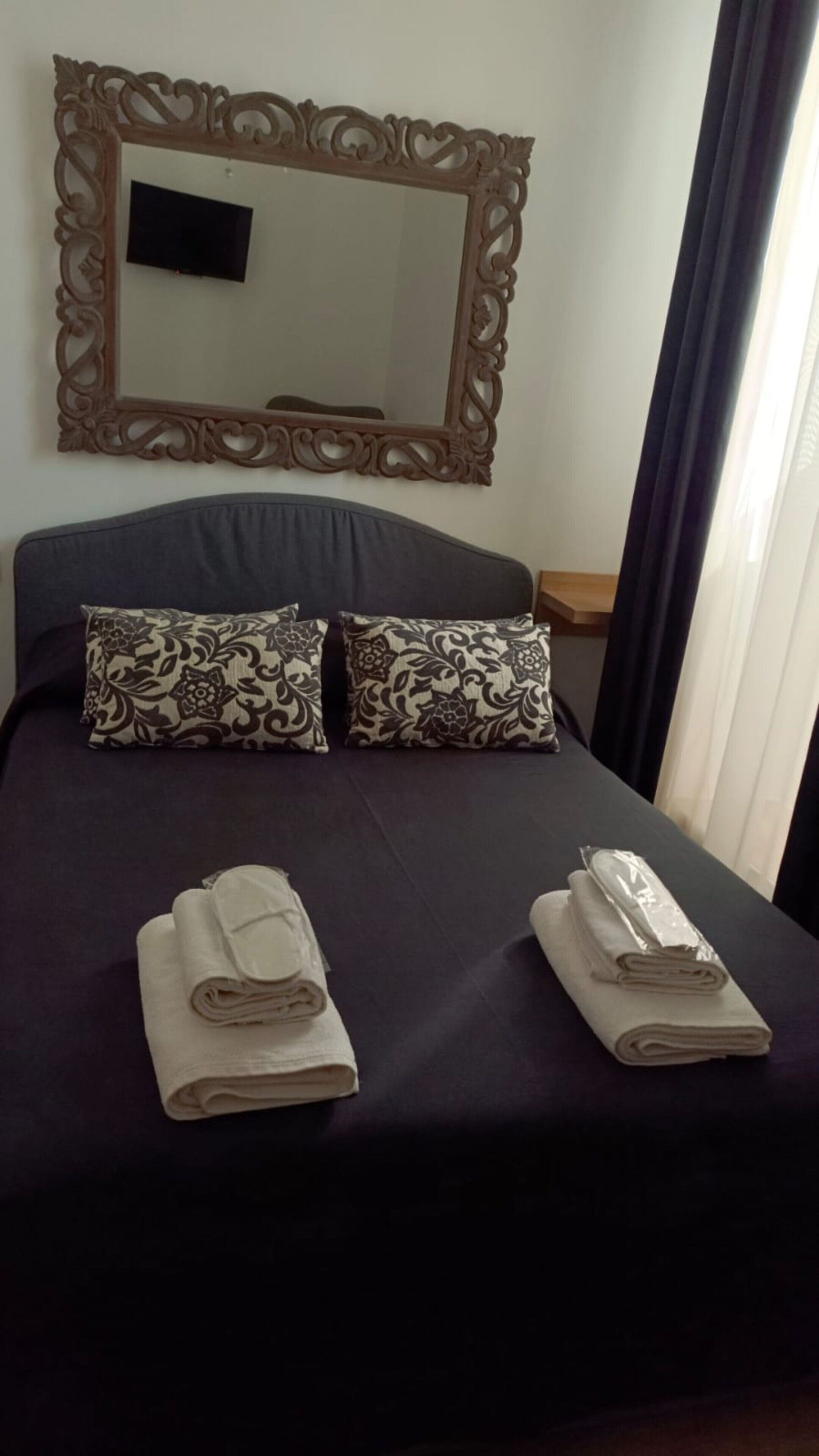 1 dormitori i roba de llit 