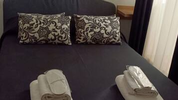 1 dormitori i roba de llit