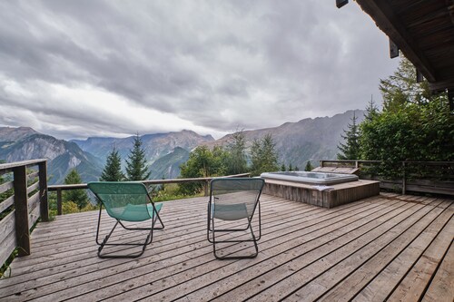Chalet 'Il Fera Beau Demain' avec vue sur les montagnes, terrasse privée et Wi-Fi