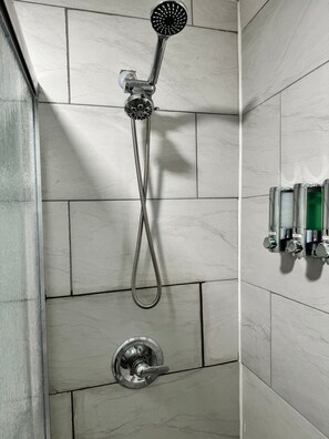 Hair dryer, towels, soap, shampoo