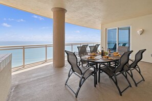 Outdoor dining - Penthouse level 3BD/3.5BA @ Ocean Vistas 1106 (Daytona Beach)