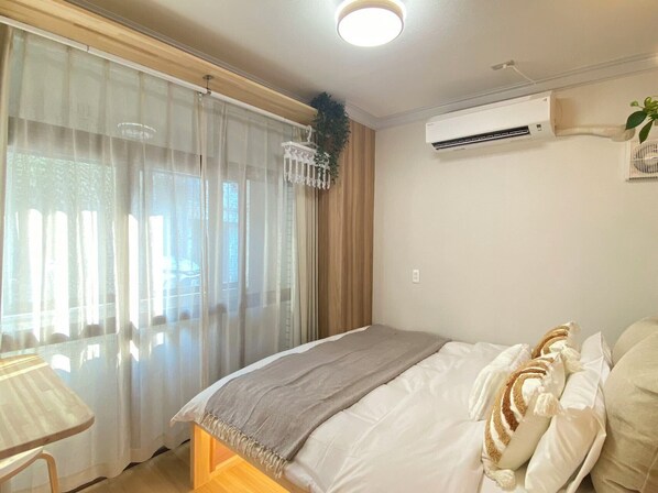 2 dormitorios, tabla de planchar con plancha, wifi gratis y ropa de cama