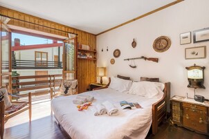 Apartamento familiar, varias habitaciones (Alme Suites) | 1 dormitorio y ropa de cama