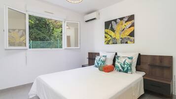 2 habitaciones, tabla de planchar con plancha, wifi y ropa de cama