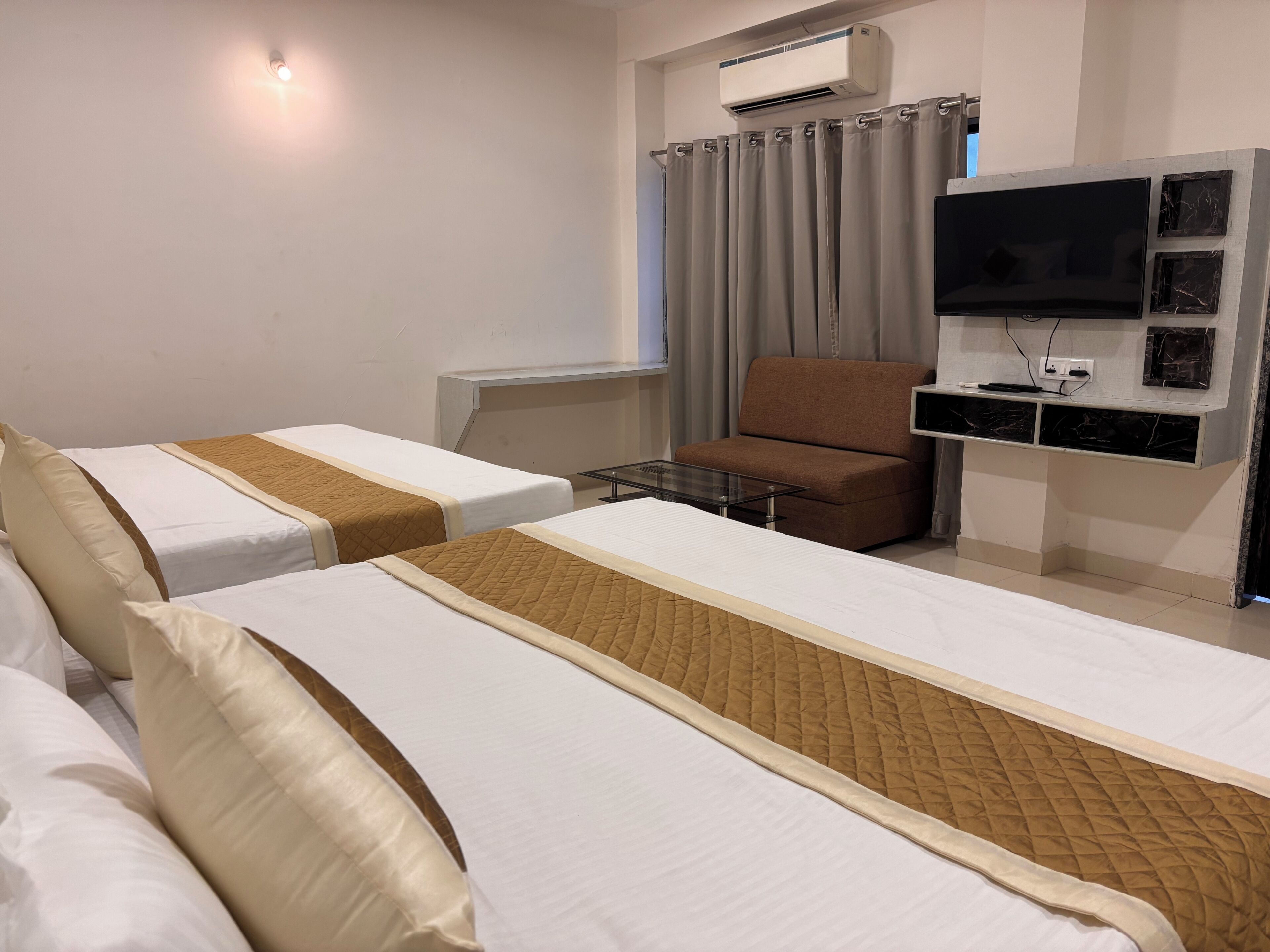 Family Double Room, Multiple Beds, City View | Premium bedding, down comforters, memory foam beds, free WiFi