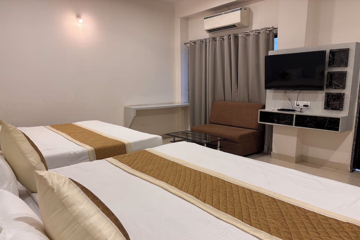 Family Double Room, Multiple Beds, City View | Premium bedding, down duvets, memory-foam beds, free WiFi
