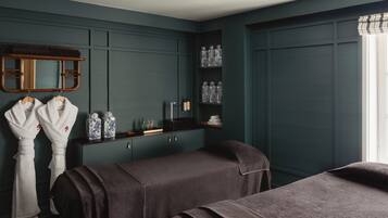Relax in a serene space with a large mirror, plush bathrobes, and spa-inspired amenities.