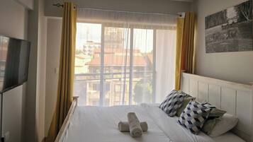 1 habitación, tabla de planchar con plancha, wifi gratis y ropa de cama