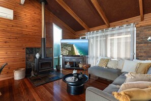 TV, fireplace, books, offices - Hilltop Hideaway at Coolum Beach (Coolum Region)