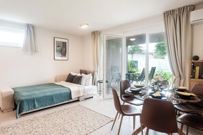 Appartement, 1 chambre, vue jardin | Coin séjour