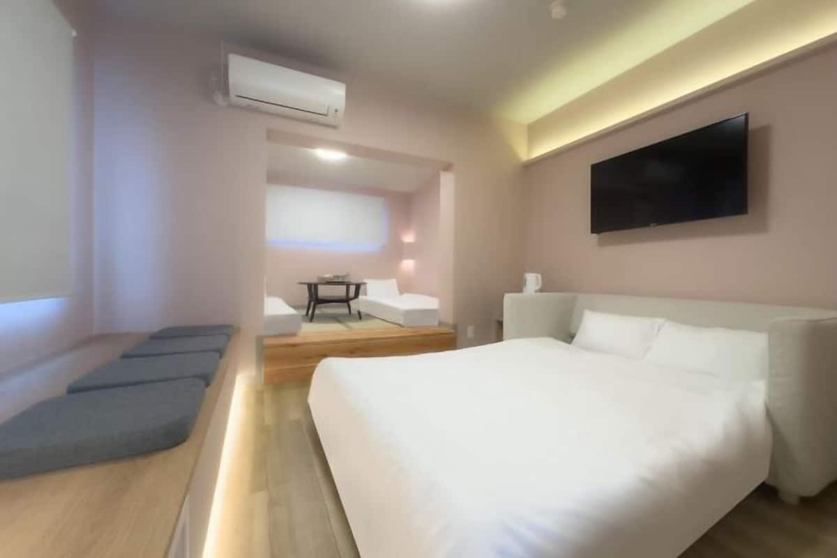1 bedroom, blackout drapes, soundproofing, iron/ironing board