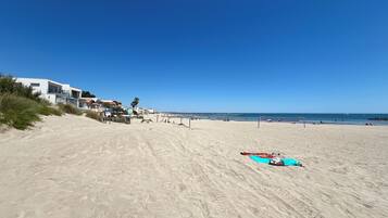 On the beach, beach towels